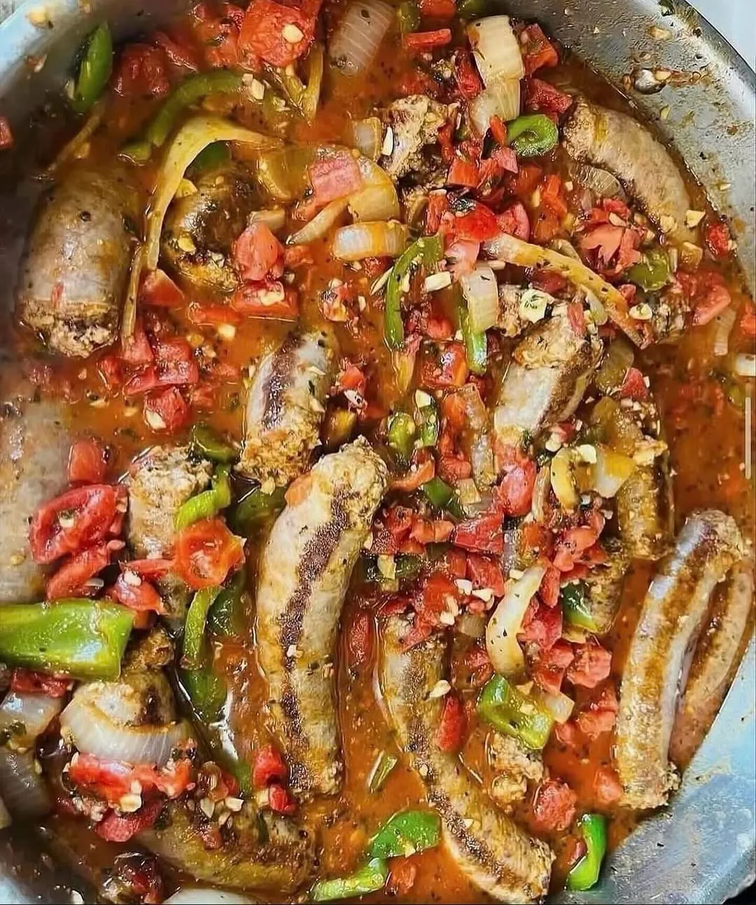 Italian sausage slow cooked with peppers and onions